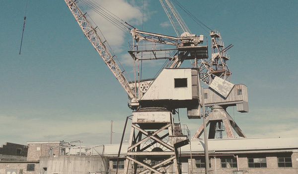 Photograph of decommissioned dock cranes
